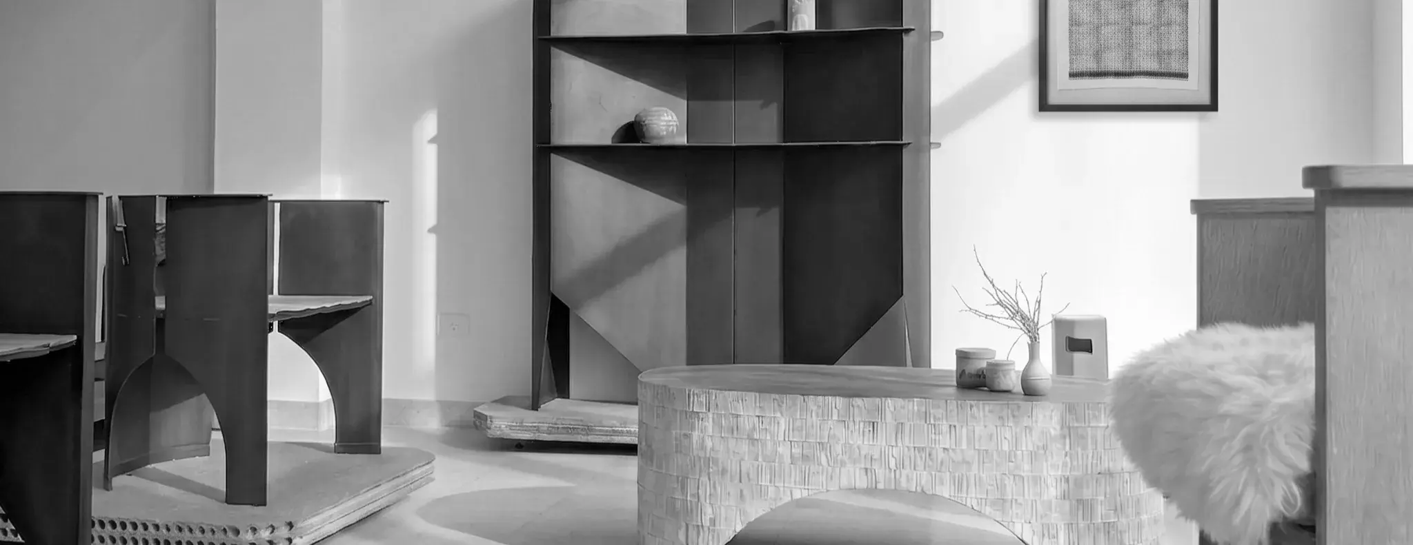 Karmeh Collection: carved coffee table, steel shelving and armchairs